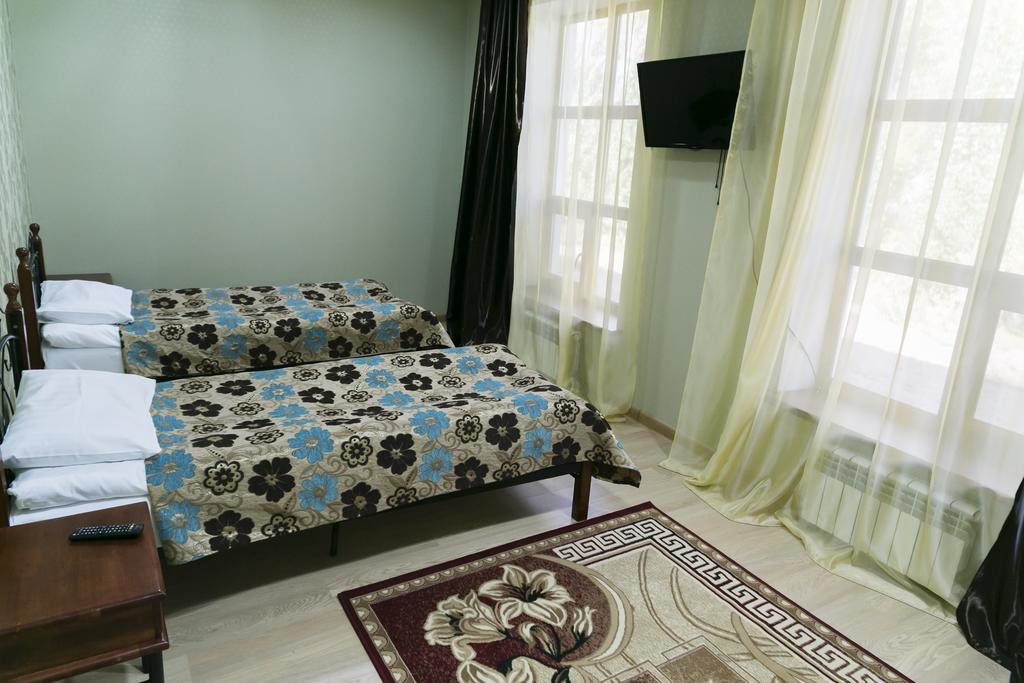 Green Land Hotel Актобе Стая снимка