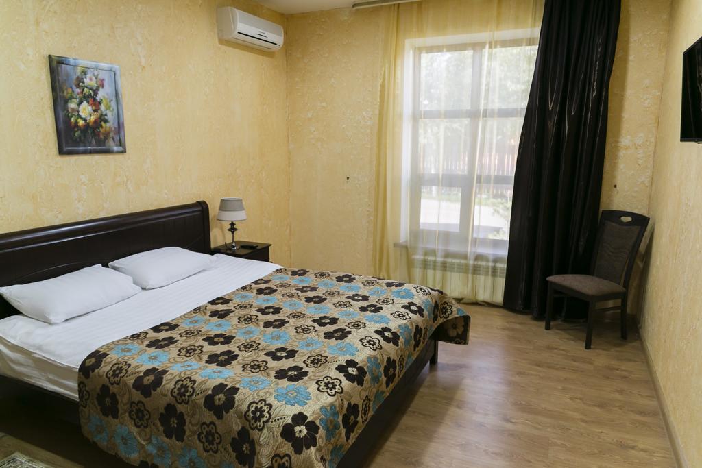 Green Land Hotel Актобе Стая снимка