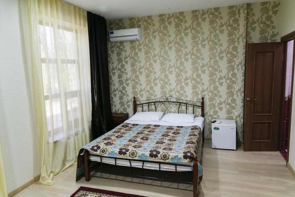 Green Land Hotel Актобе Стая снимка