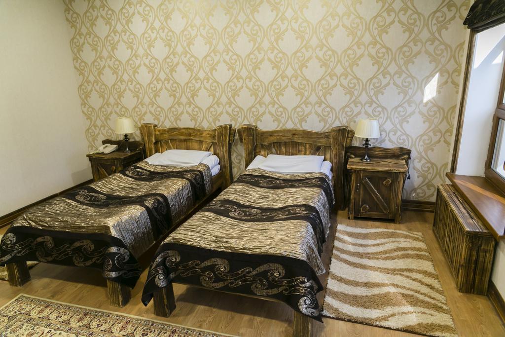 Green Land Hotel Актобе Стая снимка